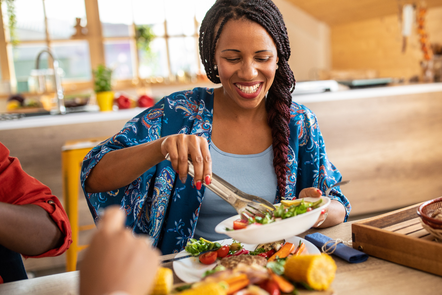 A person eating a vegan meal