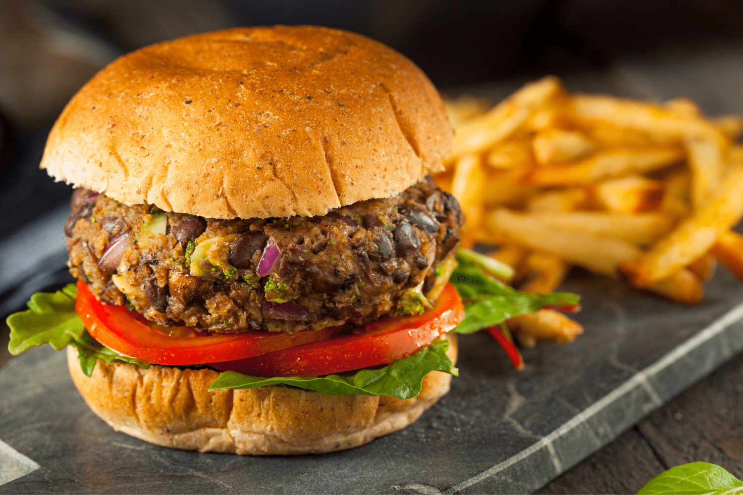 A black bean burger with fries